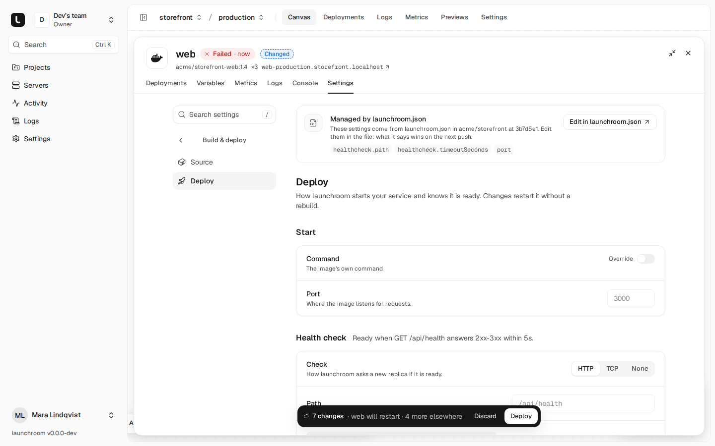 Deploy settings of web with a banner 'Managed by launchroom.json' listing the fields the file controls, an Edit in launchroom.json link, and start command, port and health check settings.