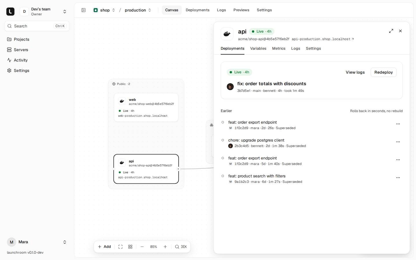 Service panel for api open beside the canvas, Deployments tab: the live deployment 'fix: order totals with discounts' with View logs and Redeploy, and four earlier deployments that can be rolled back.